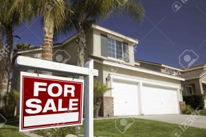 4652320-Red-For-Sale-Real-Estate-Sign-in-Front-of-House--Stock-Photo