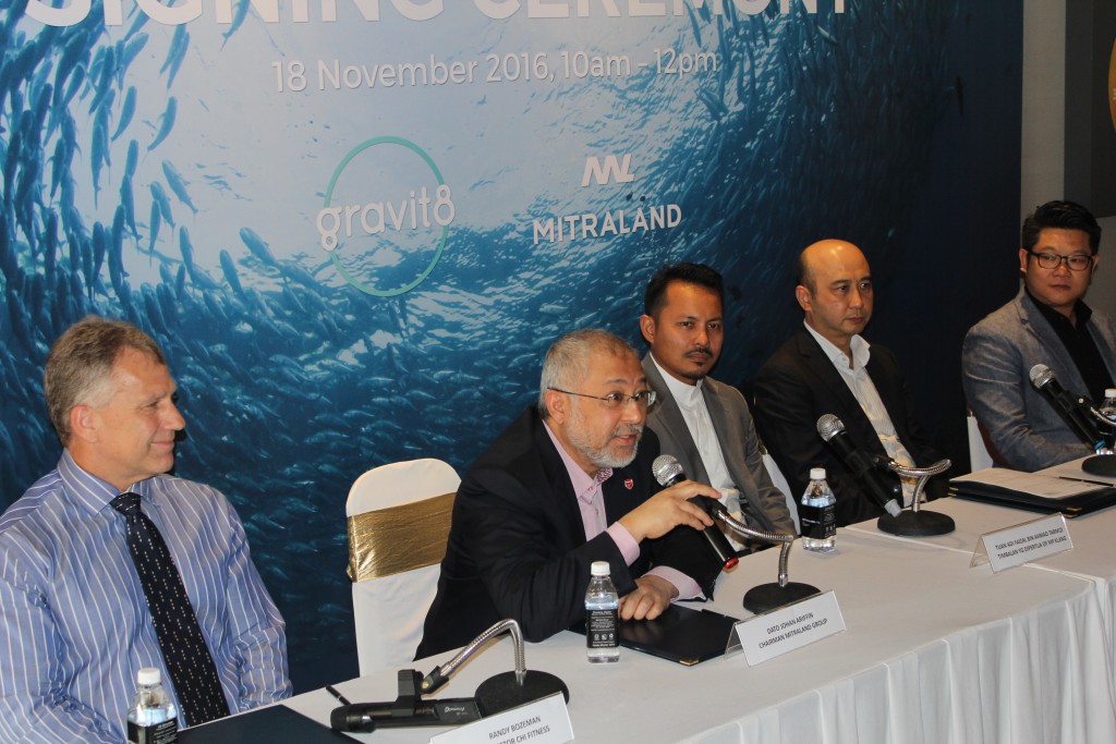 At the press conference: (with mic) Dato Johan Ariffin, Chairman of Mitraland Group answering questions from the media.