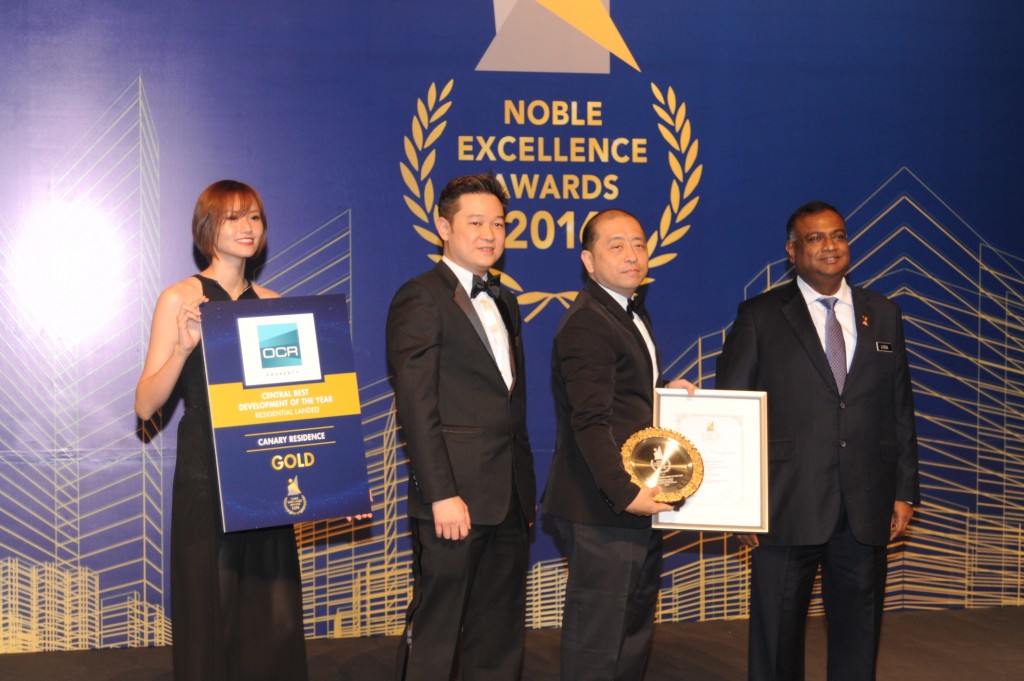 Mr. Eric Tan, Manager (Project Management) of OCR Land Holdings receiving the ‘Central Best Development of the Year: Residential Landed’ Award (GOLD) for Canary Residence, located in Cheras Hartamas, Selangor